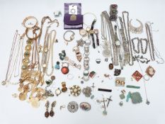 A collection of costume jewellery including rolled gold bangle, 9ct gold brooch (0.2g), a collection