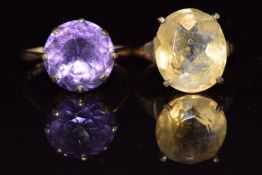 Two 9ct gold rings, one set with a synthetic purple sapphire and a citrine, 6.6g, sizes M & O
