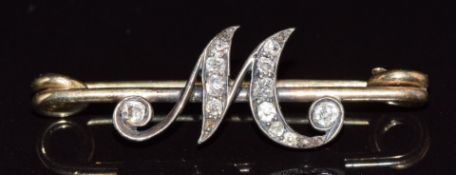 Late Victorian 'M' brooch set with old cut diamonds, 3.1g, 3.2cm