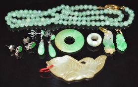 A jade fish pendant, jade bi-disc, two jade pendants, 14k white gold earrings set with jade and a