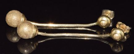 A pair of 18ct gold earrings with a textured sphere drop, 6.2g