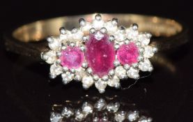 A 9ct gold ring set with rubies and diamonds, 2g, size O