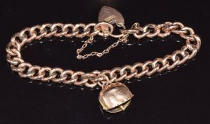 A 9ct rose gold bracelet with heart padlock clasp and 9ct gold bell charm, 11.6g, 21cm long