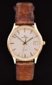 Garrard 9ct gold gentleman's wristwatch with date aperture, two-tone hands and baton hour markers,
