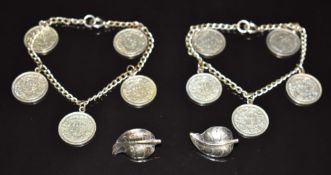 Two bracelets with Swiss coin charms and pair of silver earrings