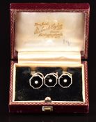 Three 18ct gold and platinum studs set with onyx and seed pearls, 4g