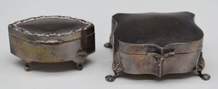 Two hallmarked silver dressing table caskets, one Birmingham 1907 of lozenge shape with fitted