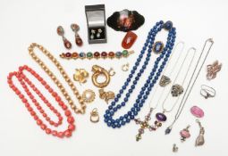 A collection of costume jewellery including Hollywood brooch, Trifari necklace, silver pendant, etc
