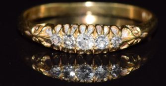An 18ct gold ring set with five diamonds, in vintage box, 2.8g, size Q