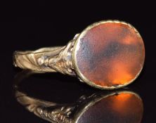 A 19thC gold ring set with a foiled paste, 3.5g, size L