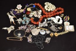 A collection of jewellery including a pair of moonstone earrings, necklaces including garnet,