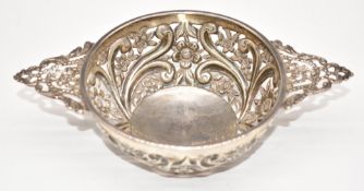 Victorian hallmarked silver quaiche with embossed and pierced decoration, Birmingham 1894, maker