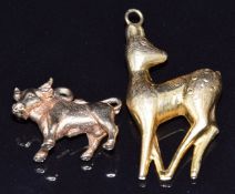 A 9ct gold charm in the form of a bull and another 9ct gold charm in the form of a deer, 4.3g