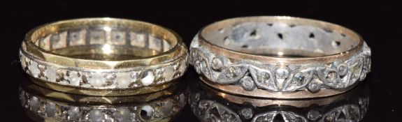 An 18ct gold eternity ring set with spinel (3g, size L/M) and a 9ct gold and silver eternity ring