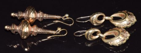 A pair of Victorian yellow metal earrings with faceted decoration and another pair of Victorian