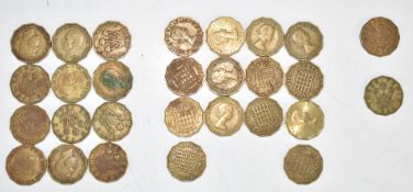 Twenty eight UK brass threepenny pieces to include the low mintage 1946 examples, a 1937 proof, a