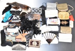 Collection of vintage evening bags, shoes and textiles, in two vintage suitcases