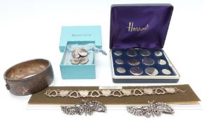 Two Victorian cut steel buckles mounted with rotating butterflies, silver bangle, Tiffany & Co