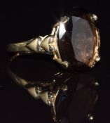 A 9ct gold ring set with an oval smoky quartz, 3.5g, size N