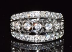 A 14k white gold ring set with cubic zirconia, 3.6g, size J