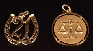 An 18k gold pendant depicting Libra birth sign (1.7g) and 9ct gold pendant in the form of a