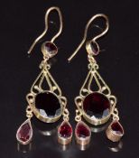 A pair of 9ct gold earrings set with garnets, 6.9g, 4.4cm