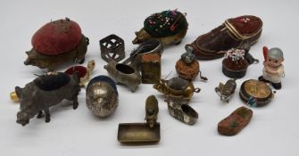 Collection of vintage pin cushions including a including a wild boar, pigs, leather shoe, chick
