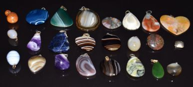 A collection of agate pendants including lace agate, Victorian heart shaped, etc