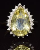 A 9ct gold ring set with a pear cut quartz and diamonds, 4.6g, size M