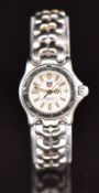 Tag Heuer Professional ladies wristwatch with date aperture, luminous hands and hour markers,