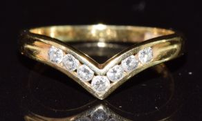 An 18ct gold V shaped ring set with diamonds, 2.8g, size N