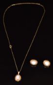 A 9ct gold suite of jewellery comprising earrings and necklace set with opals, 40cm long