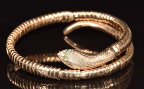 A 9ct gold snake bangle with metal core, 17.5g