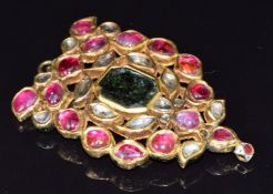 Indian yellow metal pendant set with foiled rubies, diamonds and a quartz with enamel decoration