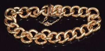 An 18k gold curb link bracelet, 27.1g, 21cm long