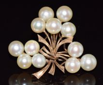 A 10k gold brooch set with pearls in a stylised bouquet design, 7.5g, 3.5cm x 3cm