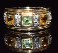 A 9ct gold ring set with peridot, citrine and diamonds, 4.5g, size M/N