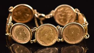 A 9ct gold bracelet set with seven gold half sovereigns comprising 1901, 1914 with Sydney mint mark,