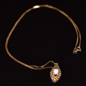 A 9ct gold pendant set with opal, on 9ct gold chain, 3.3g, 51cm long