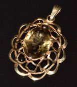 A 9ct gold pendant set with a smoky quartz, 10.2g