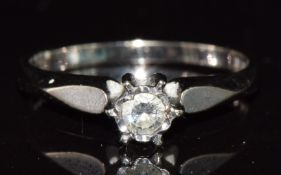 An 18ct white gold ring set with a diamond of approximately 0.15ct, 2.6g, size M