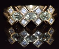 A 9ct gold ring set with topaz and sapphires, 2.9g, size N