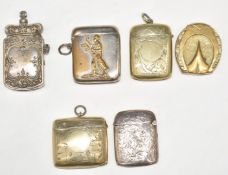 Hallmarked silver vesta case, horseshoe vesta case, and four other vestas including a golfing