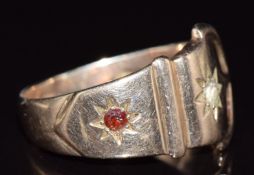 A 9ct gold buckle ring set with a garnet and paste, 3.9g, size O