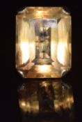 A 9ct gold ring set with a large emerald cut quartz, 14.7g, size N
