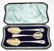 Cased set of three Georgian hallmarked silver berry spoons comprising a pair of berry spoons, London