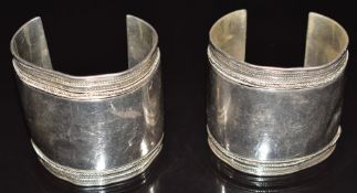 A pair of silver cuffs/ bangles with rope twist decoration, 189.1g