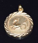 An 18ct gold Zodiac pendant, 2g, 1.5cm