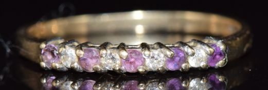 A 9ct gold ring set with amethyst and cubic zirconia, 1.3g, size M