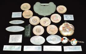 Ten Chinese mother of pearl counters, a nephrite jade pendant, Chinese beads, mother of pearl